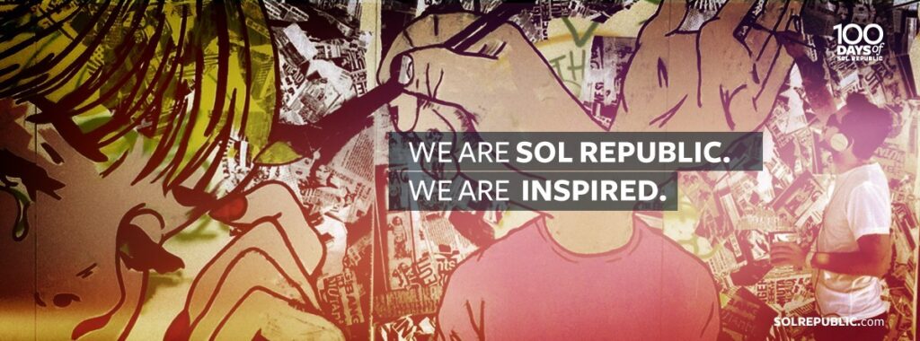 Человек на фоне стены с граффити и коллажем, надпись We are inspired